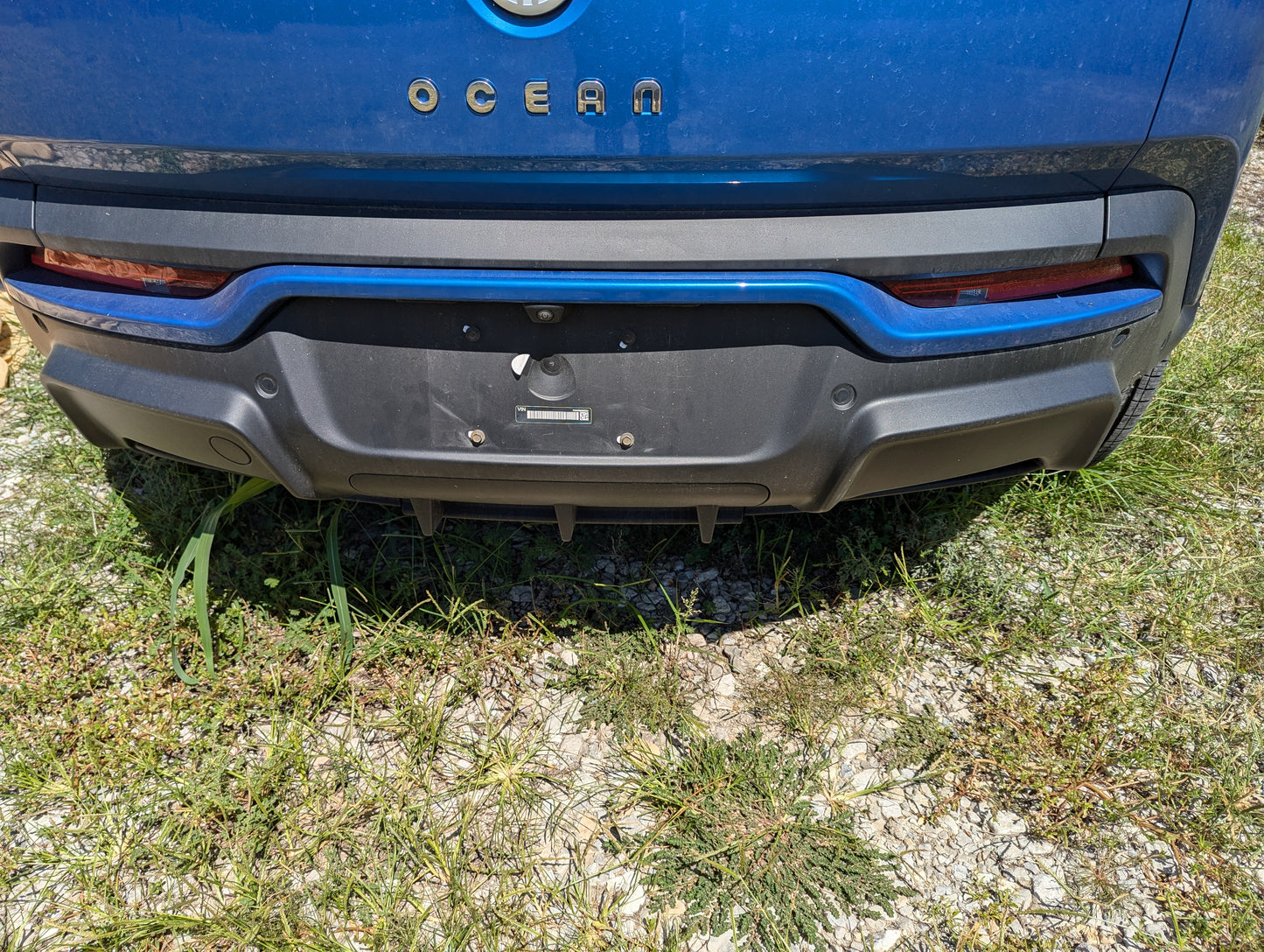 2023 Fisker Ocean Rear OEM Bumper W/ REFLECTORS only (no camera)