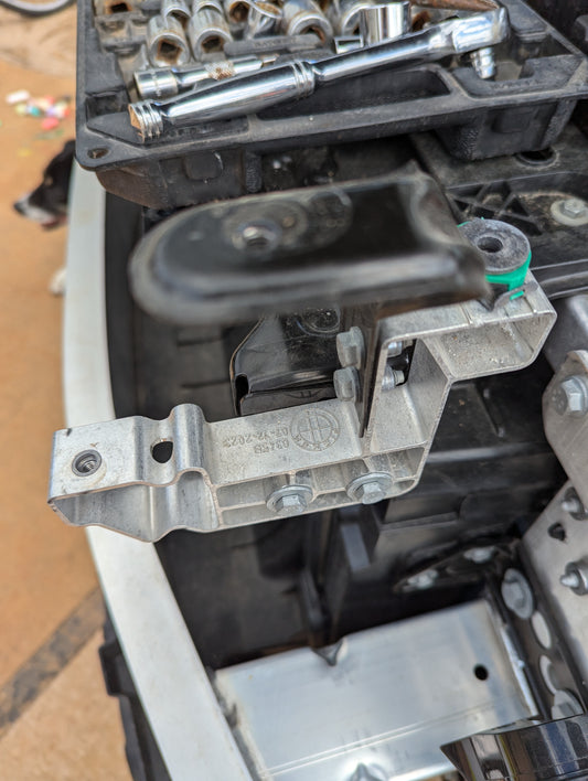 2023 Fisker Ocean left headlight mounting bracket